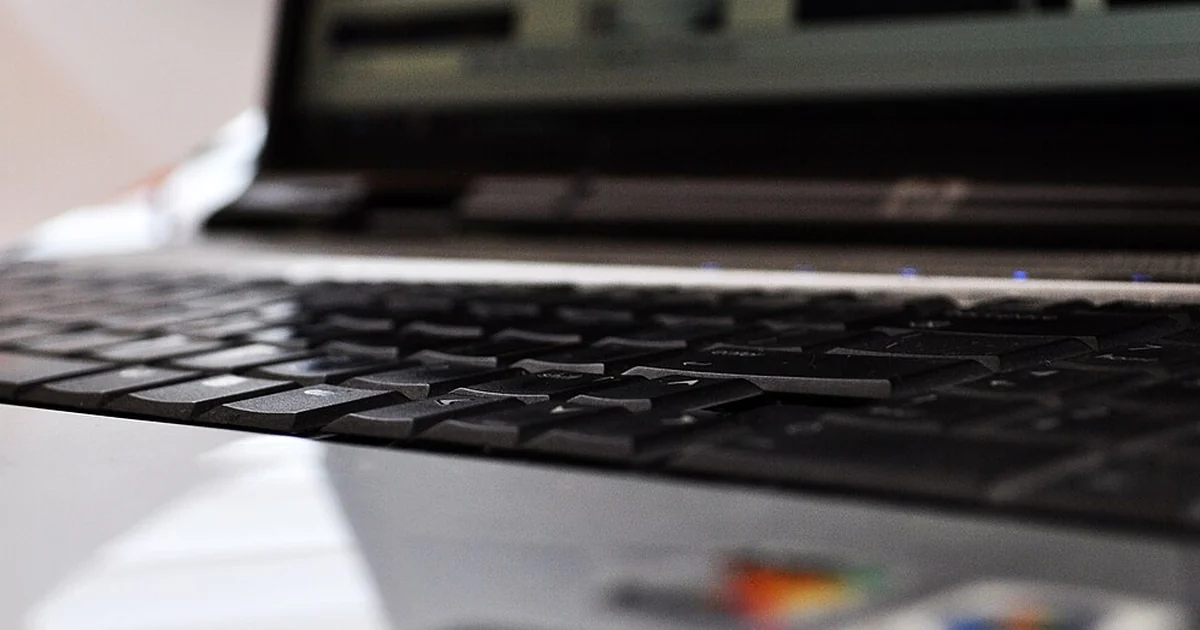 Closeup photographs of the keyboard of an HP Pavilion Entertainment PC notebook computer.